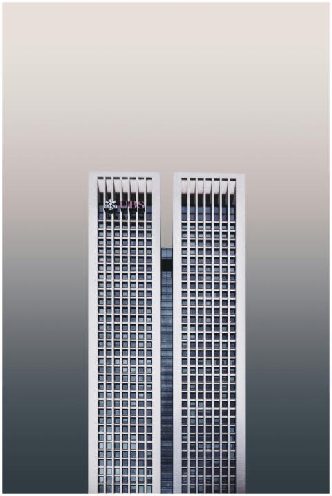 A modern twin skyscraper with a minimalist facade