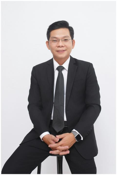 Business professional in a black suit, elegant and