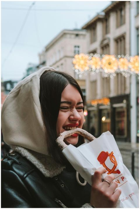 Happy young woman in Wrocław, Poland enjoying a pr