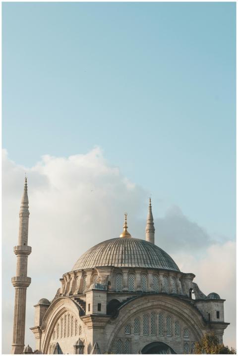 A scenic view of a historic mosque with tall minar