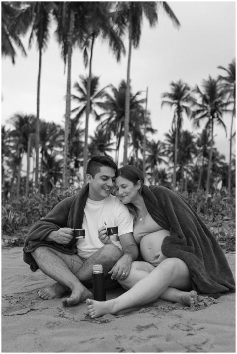 A couple embracing on a tropical beach, enjoying a