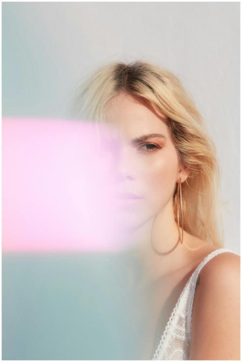 Stylized portrait of a woman with soft lighting an