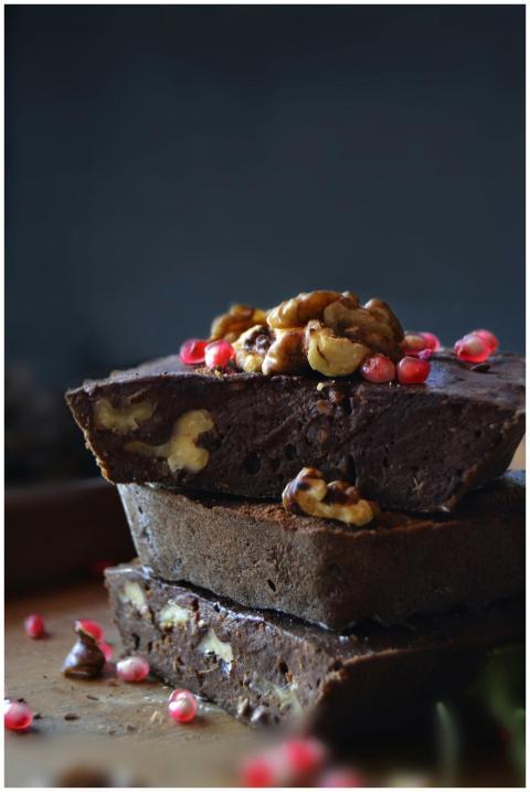 Delicious stacked chocolate brownies topped with w