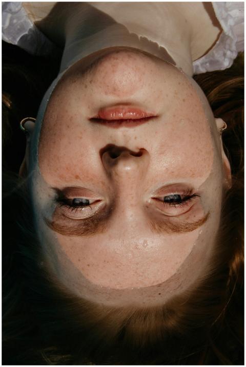 Artistic close-up portrait of a woman's face with