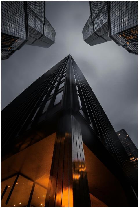 A low angle view of skyscrapers reaching into a mo