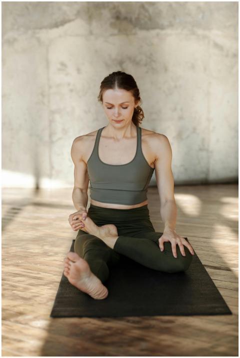 Young woman in yoga pose, embracing wellness in a