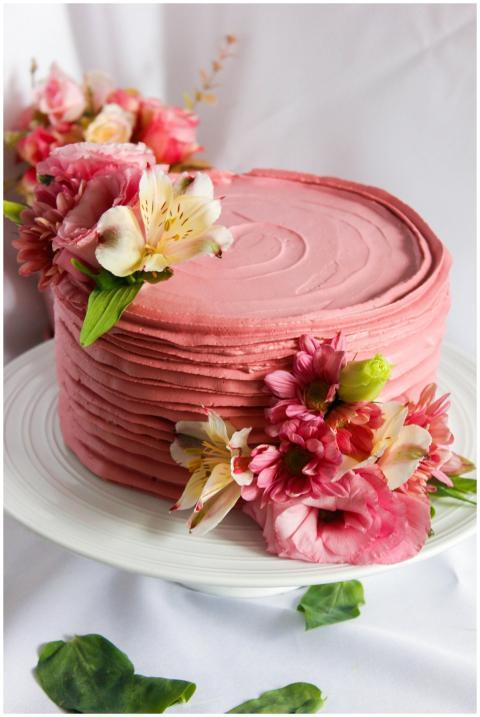 Close-up of a pink floral cake with delicate bloss