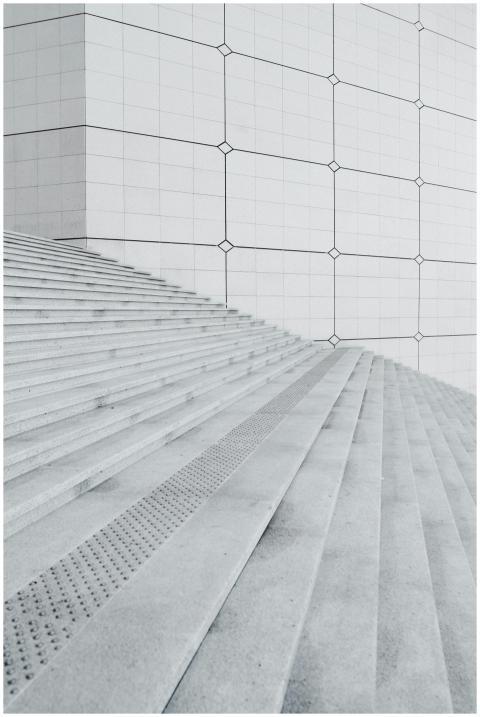 Geometric patterns on concrete stairs and wall sho