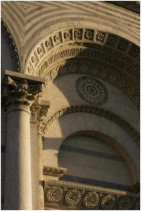 Close-up of Pisa Cathedral's ornate facade showcas