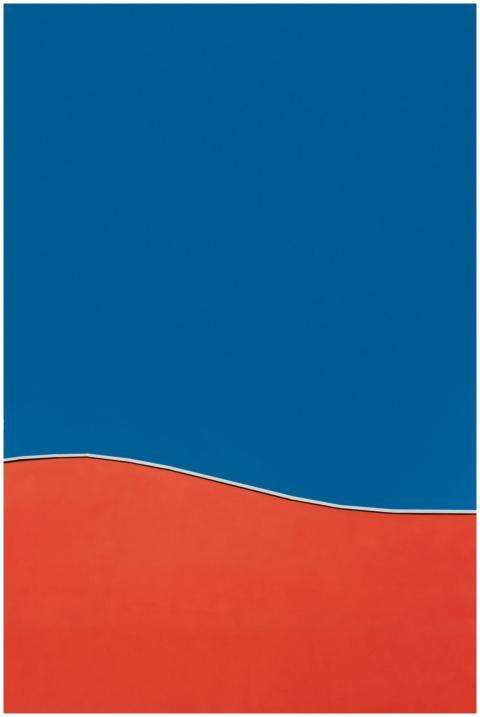 A vibrant abstract design featuring a bold red cur