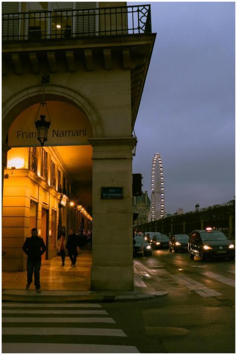 Evening urban scene in Paris showcasing a lit Ferr