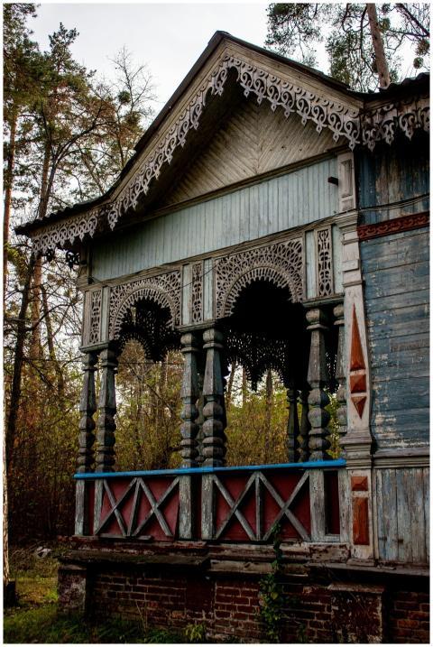 Decorative wooden porch with intricate detailing s
