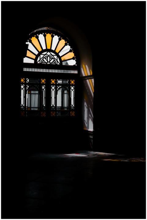 Explore the beauty of an arched stained glass wind