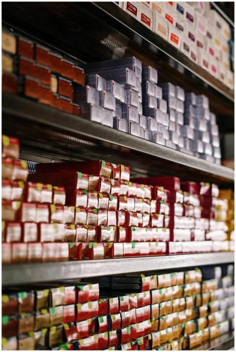 Vertical shot of neatly stacked colorful hair dye