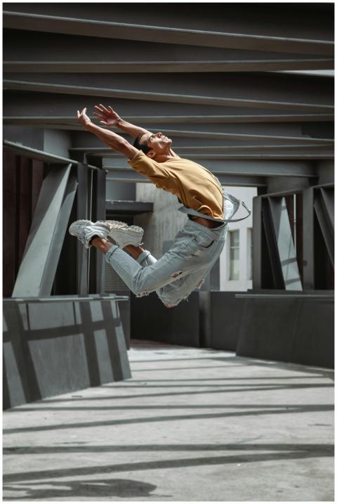 Young male dancer performing a high-energy ballet