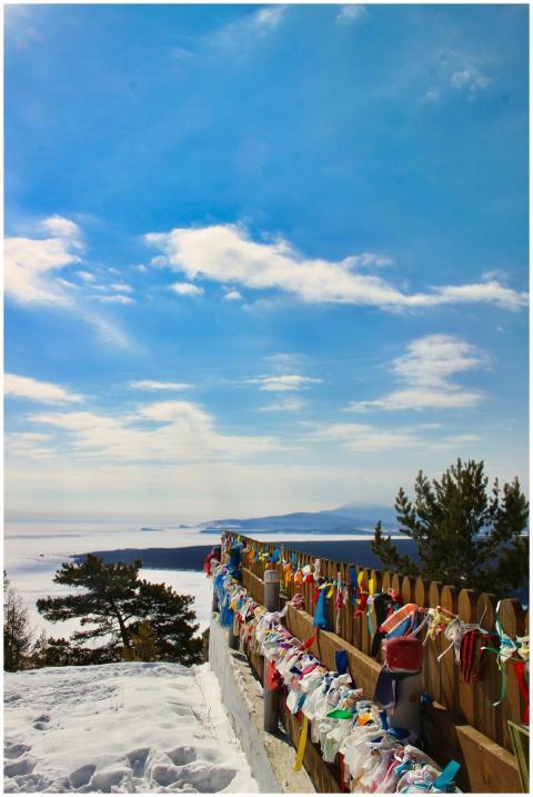 Scenic winter view with colorful prayer flags and