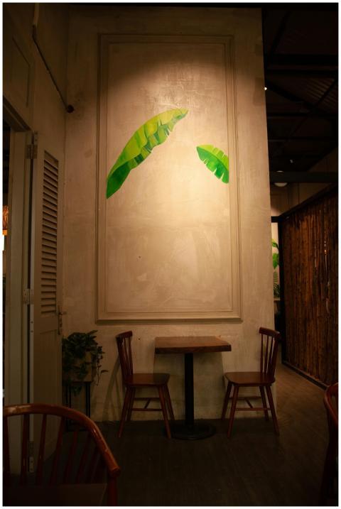 Warm indoor restaurant interior with seating and v