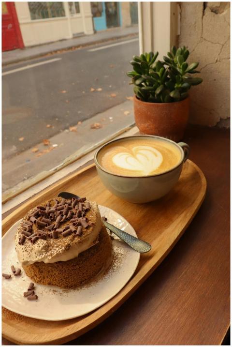 Delicious cappuccino and chocolate cake at a cozy
