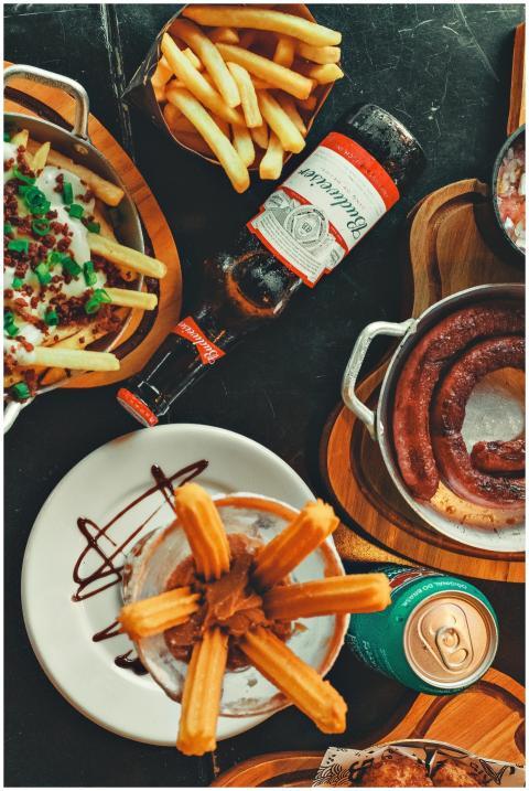 A delightful flat lay of various foods and beverag