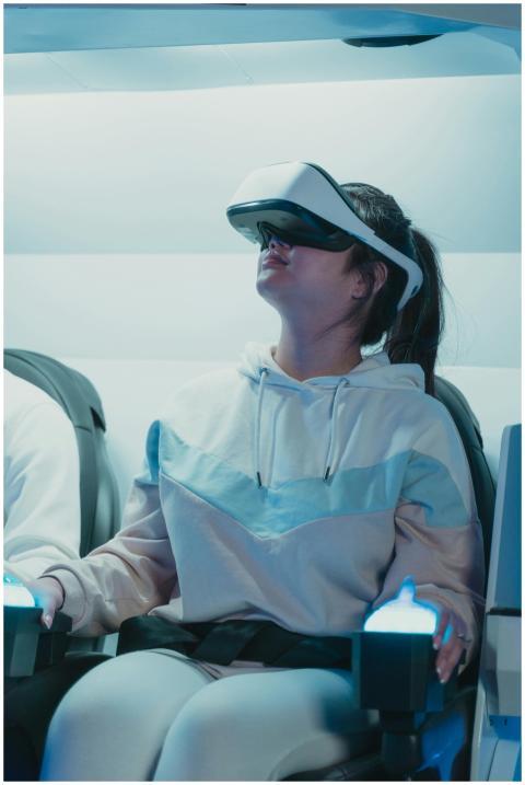Young woman in VR headset enjoying an immersive ex