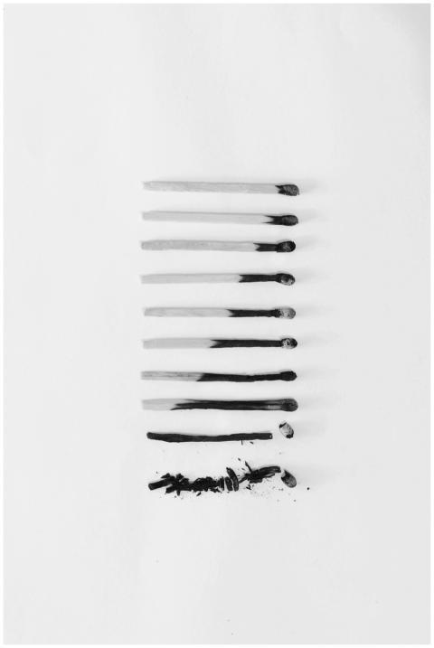 Artistic black and white image of burned matches a