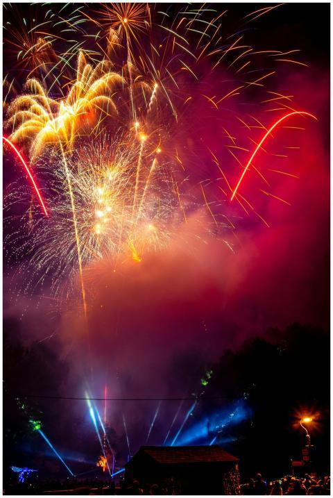 A dazzling explosion of colorful fireworks lightin
