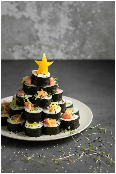Creative sushi roll arrangement resembling a tree,