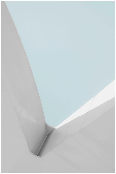 Minimalist architectural structure with a pastel b