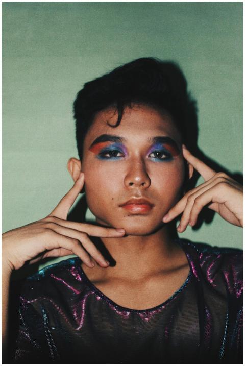 Vibrant portrait of a young Asian model with color