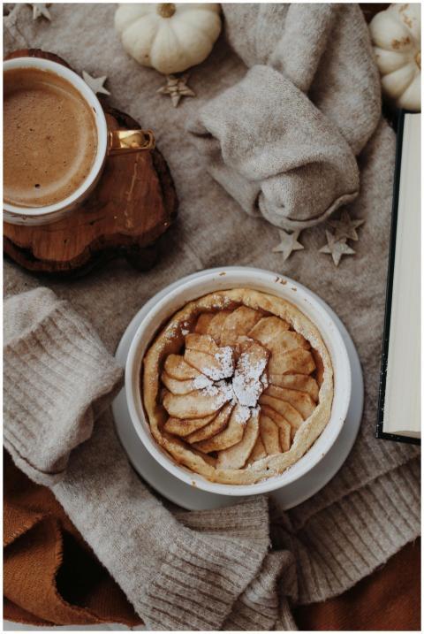 Delicious apple pie and coffee on a cozy autumn se