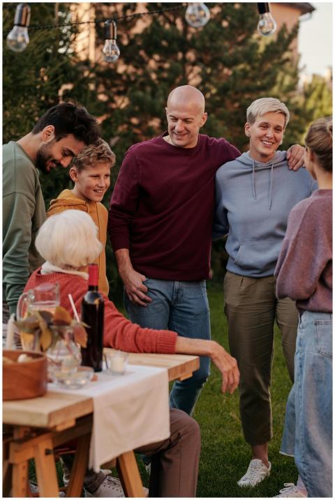A cheerful family enjoying a sunny picnic outdoors