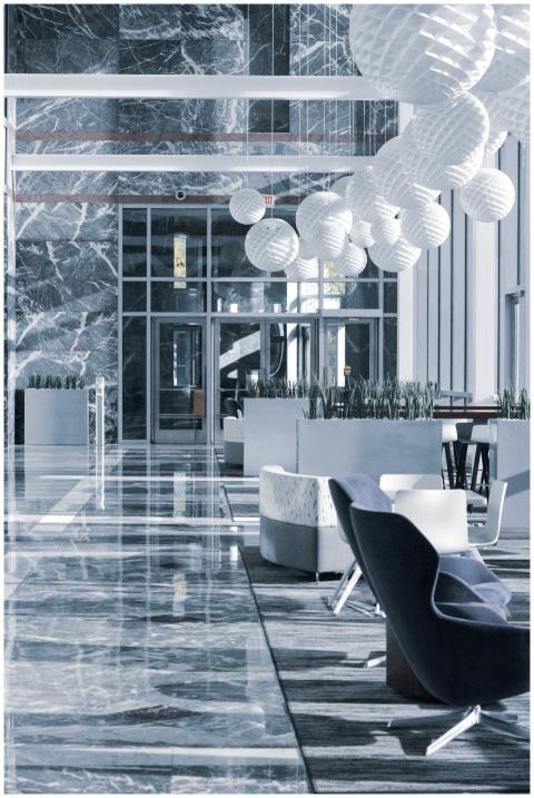 Elegant hotel lobby with marble floors and modern