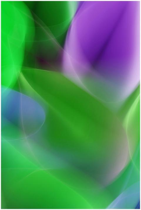 Dynamic abstract artwork featuring green and purpl