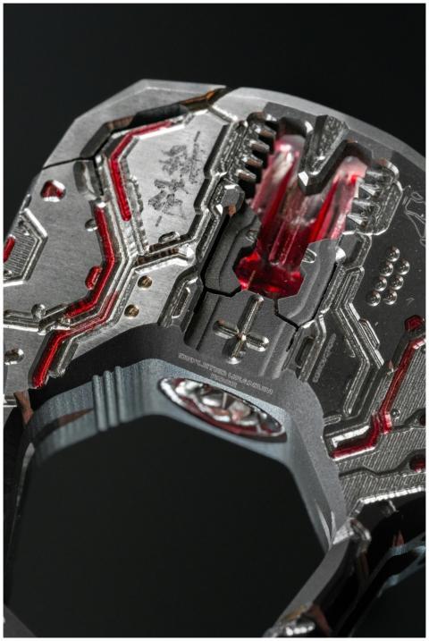 Close-up of a futuristic metallic device with intr