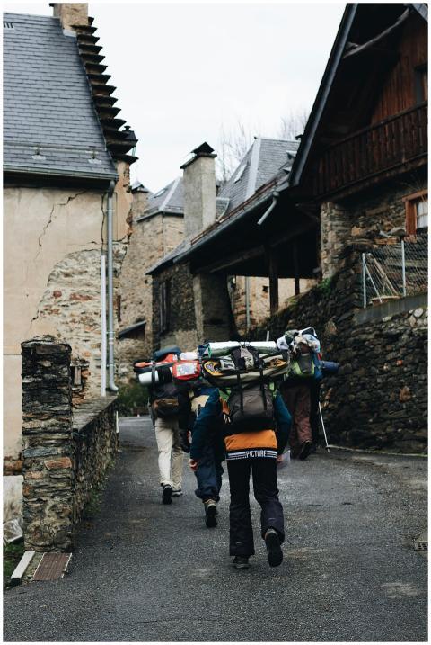 Group of hikers trekking through a picturesque sto