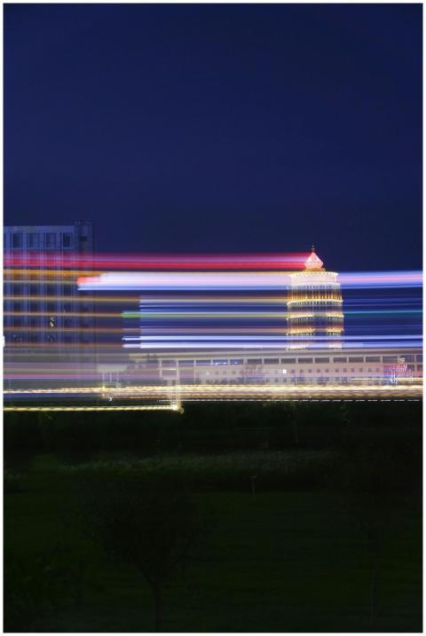 Urban night scene with motion blur light trails an