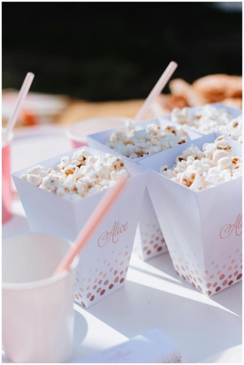 Close-up of popcorn in personalized boxes at a sun