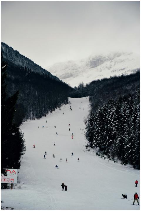Ski resort in winter Bosnia with skiers enjoying s