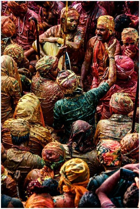 Colorful crowd celebrating Holi, the Indian festiv