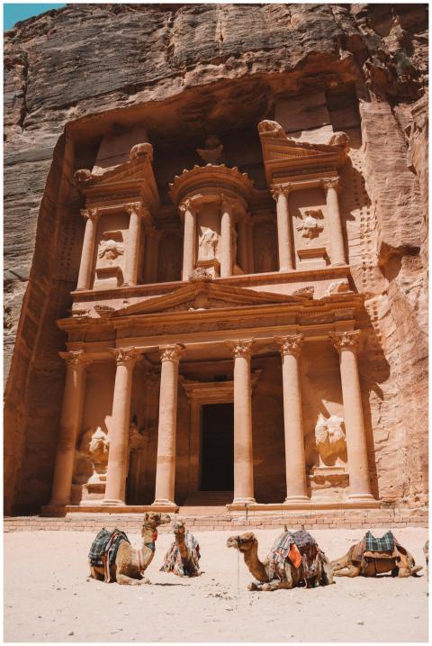 The iconic Al-Khazneh in Petra, Jordan with camels