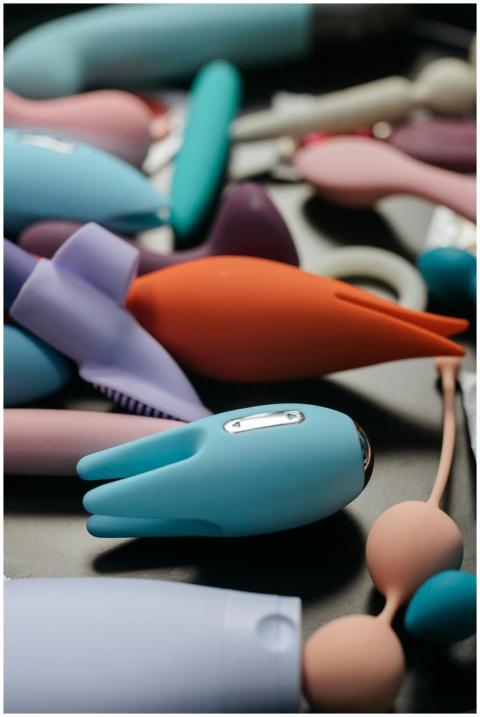 A vibrant assortment of sex toys showcasing a vari