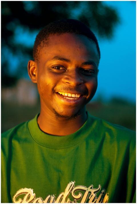 Young Man Smiling Outdoors
