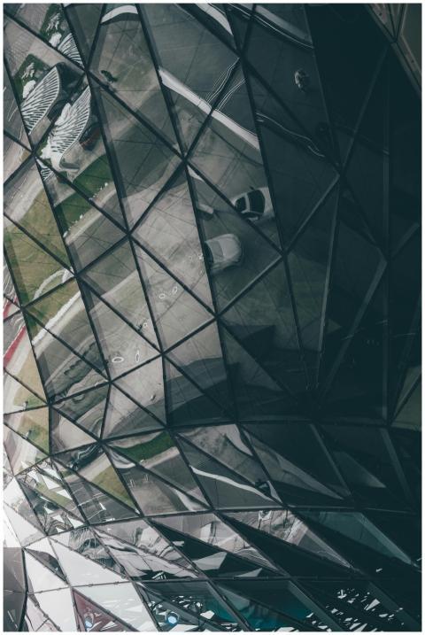 Futuristic glass building facade in Munich showcas