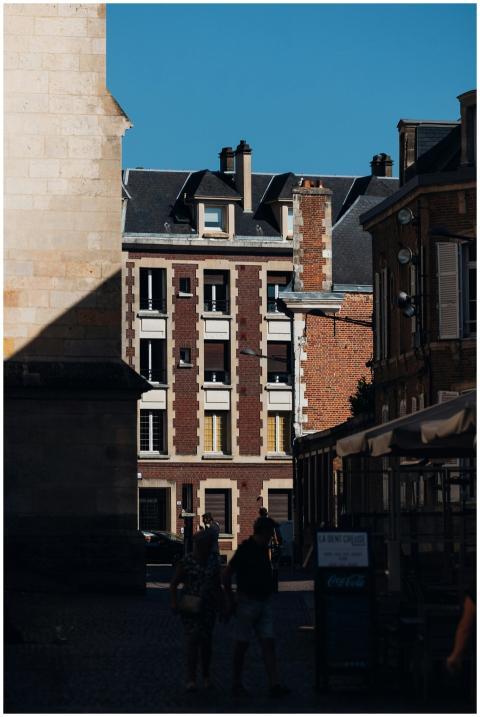 A peaceful day on a historic street in Amiens, Fra