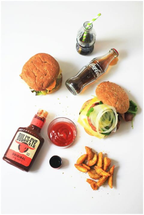 Delicious fast food meal featuring burgers, fries,