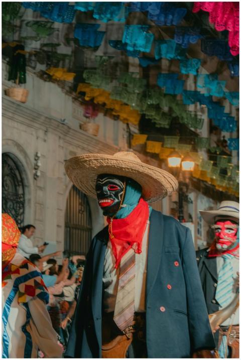 Vibrant street parade with traditional costumes an