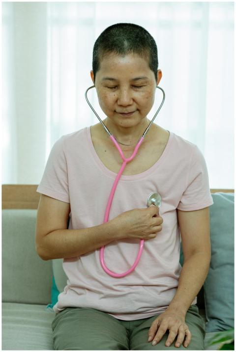 Middle aged Asian woman with short dark hair in ca