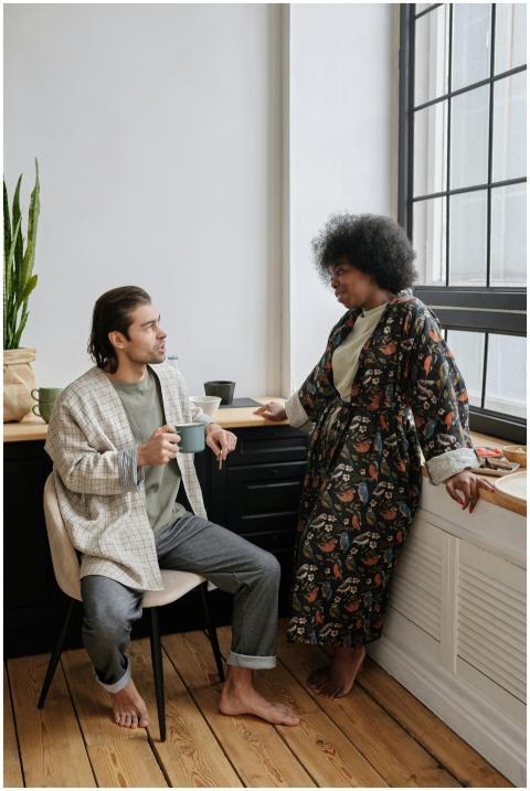 Couple enjoying morning coffee and conversation in