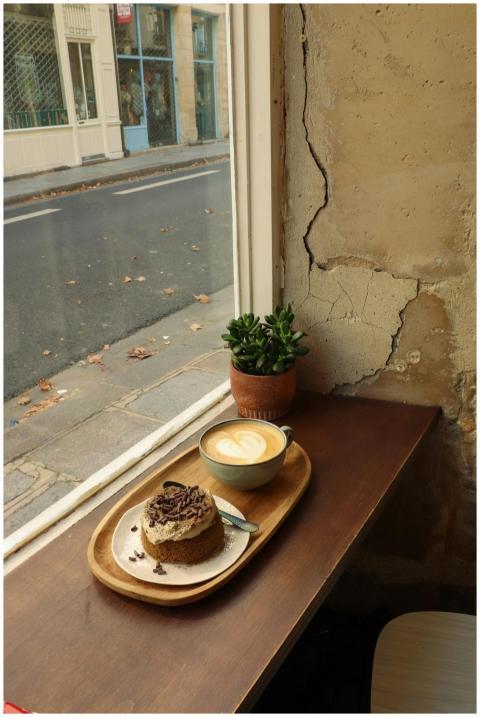 Relaxing view of coffee and dessert by a Parisian