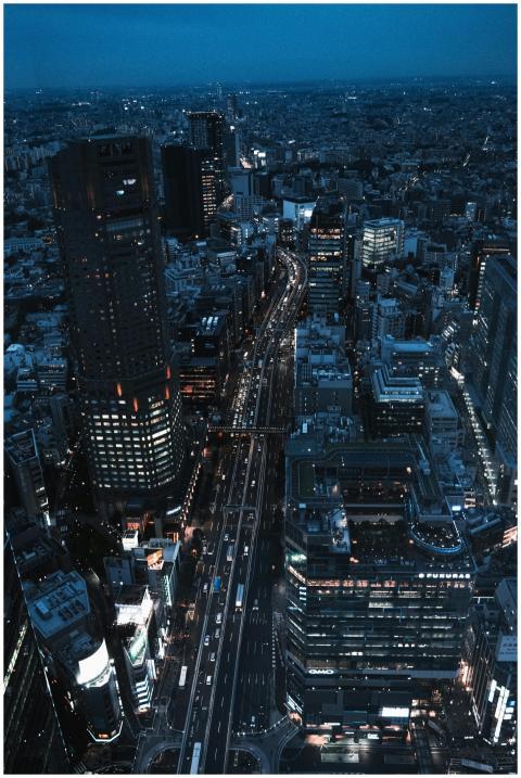 Dramatic aerial view of Tokyo cityscape at night,